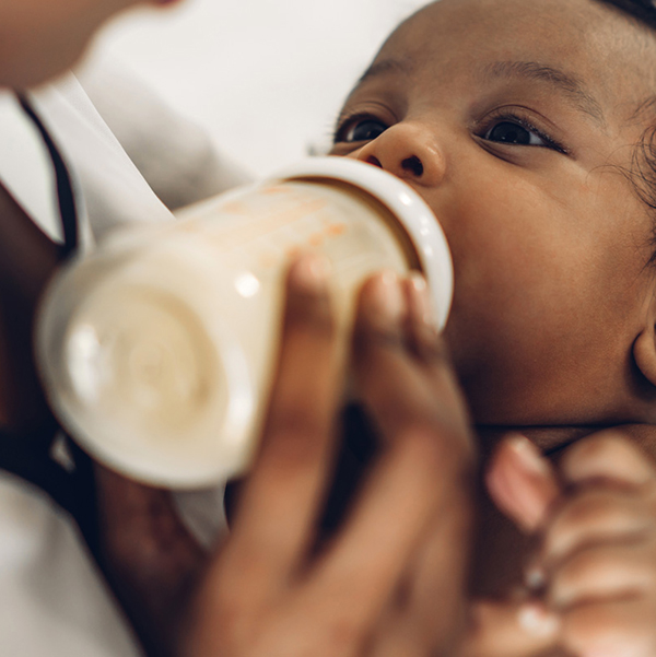 baby feeding from bottle